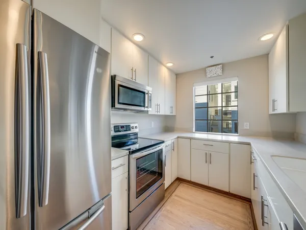 2 Bedroom Bright Corner Unit with Bay Views and Prime Marina Location